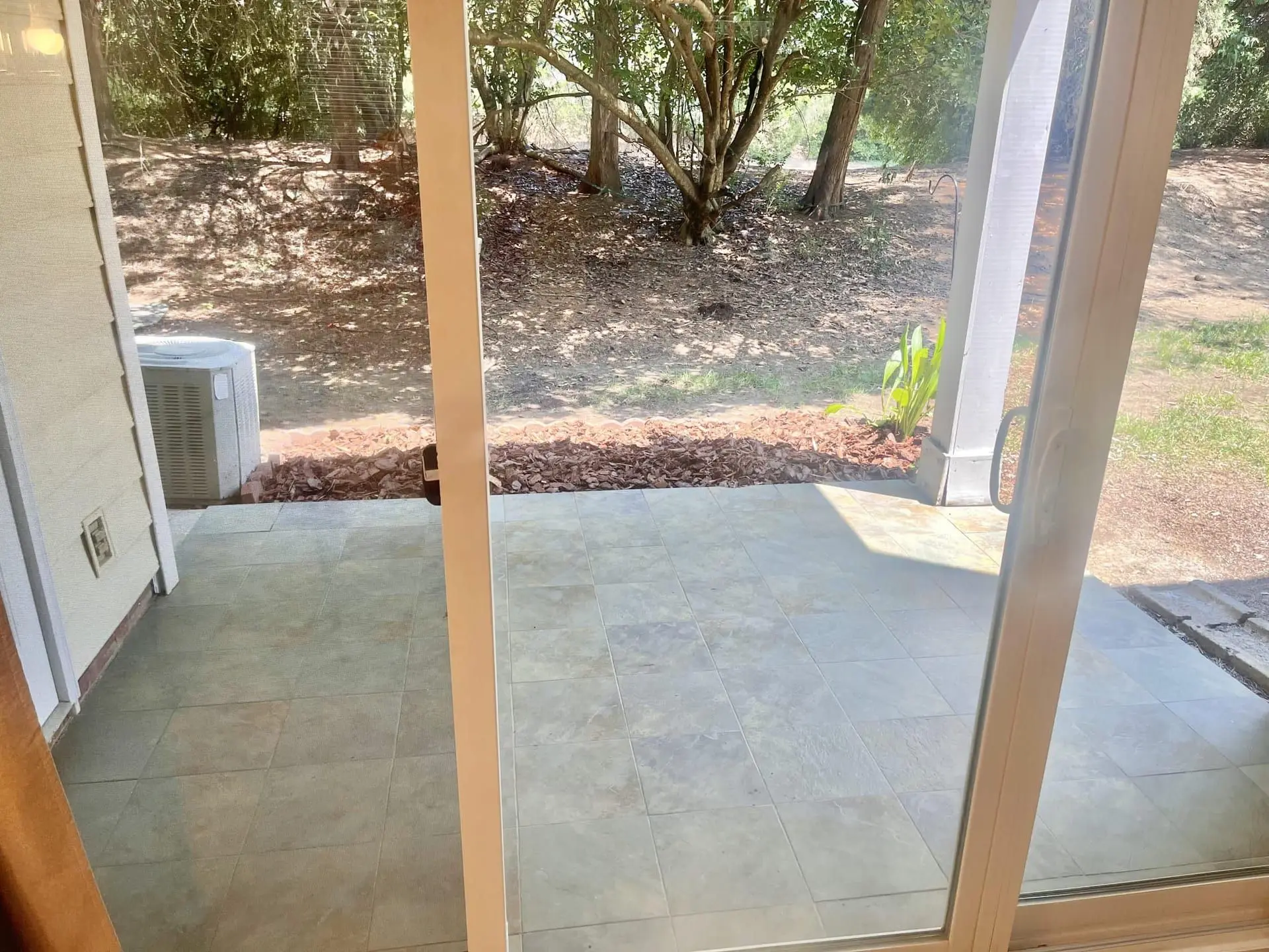 Covered patio opening to the yard